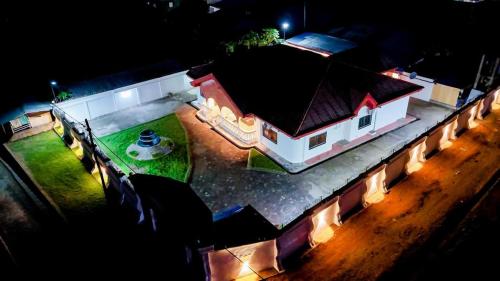 an aerial view of a house at night at Luxury Villa AC Ensuite Room 8 in Limbe
