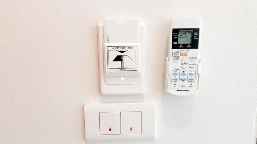 a electronic device with a scale and a thermometer at Donchan Residence in Chiang Mai