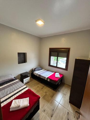 Кровать или кровати в номере Apartamento no Centro de Santana do Livramento