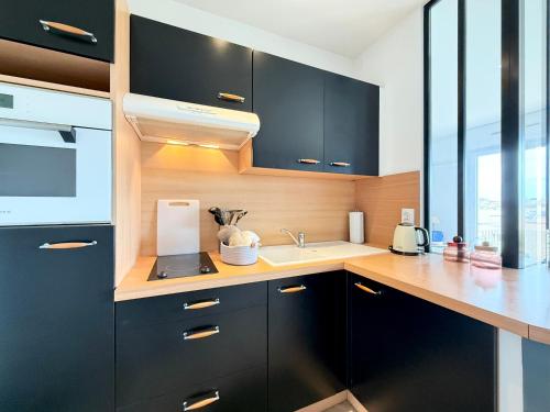 Η κουζίνα ή μικρή κουζίνα στο Studio Cozy - Balcon - Centre-Ville