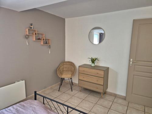 Una cama o camas en una habitación de Gîte des sonnailles