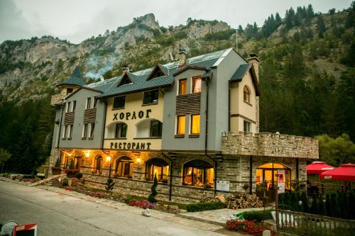 a hotel in the middle of a mountain at Horlog Castle in Trigrad