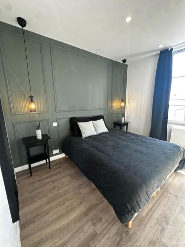 En eller flere senge i et værelse på Les Oliviers - Centre ville de Saumur