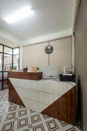 an office with a reception desk at The Aetheria Service Apartment in Chikmagalūr