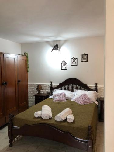 Giường trong phòng chung tại Departamento la Oma