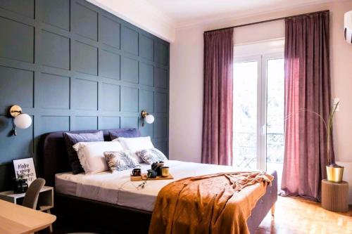 Ένα ή περισσότερα κρεβάτια σε δωμάτιο στο Agora Vista Acropolis