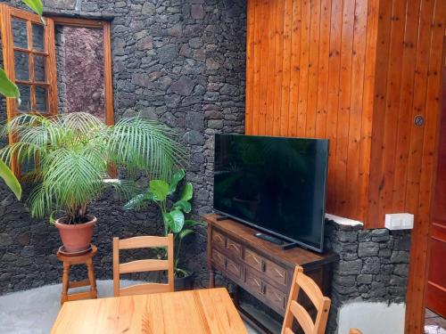 TV a/nebo společenská místnost v ubytování Vivienda vacacional Casa Rosi