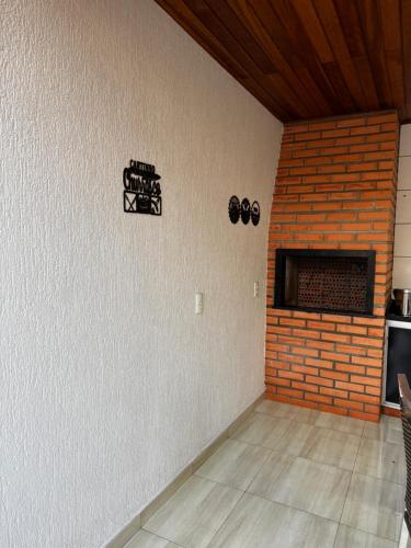 TV a/nebo společenská místnost v ubytování Casa elegante, próximo às cataratas