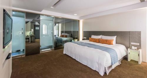 Cama o camas de una habitación en Forward Hotel Taipei Nangang