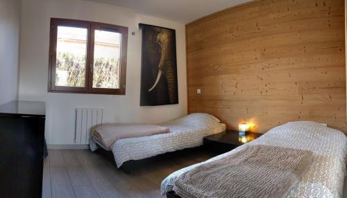 Postel nebo postele na pokoji v ubytování Confortable, au calme avec jardin, jolie vue - G3