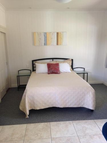 A bed or beds in a room at Horsepower Cabins