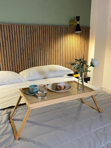 Giường trong phòng chung tại Casa Chiara-Holiday House Appartamento in centro