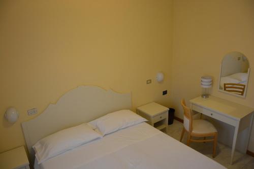 Katil atau katil-katil dalam bilik di Hotel Giotto