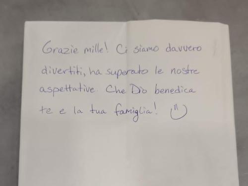 a piece of paper with writing on it at Domus Pompeii Ruins in Pompei