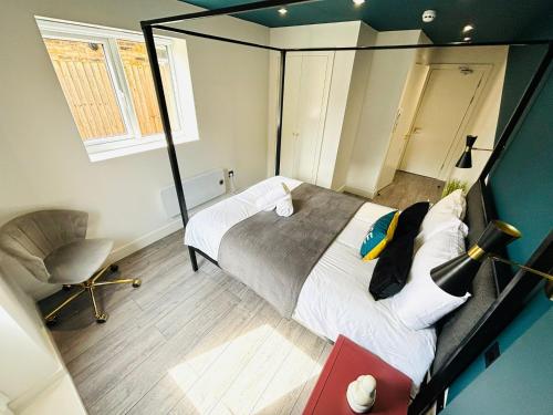 En eller flere senge i et værelse på Etta's House - NO 31 - A Cozy Urban Escape