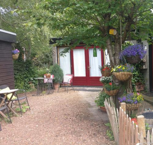 Κήπος έξω από το Bed and Breakfast Het Oude Bos