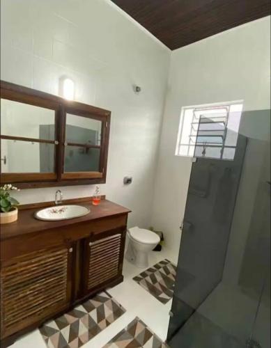 Et badeværelse på Atravessou esta na praia