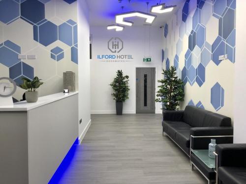 a lobby of a hospital with a waiting room at Ilford Hotel Goodmayes in Ilford