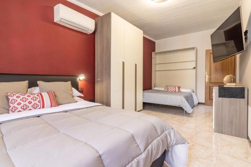 Postel nebo postele na pokoji v ubytování Cà Vivaldi penthouse 5terreparco