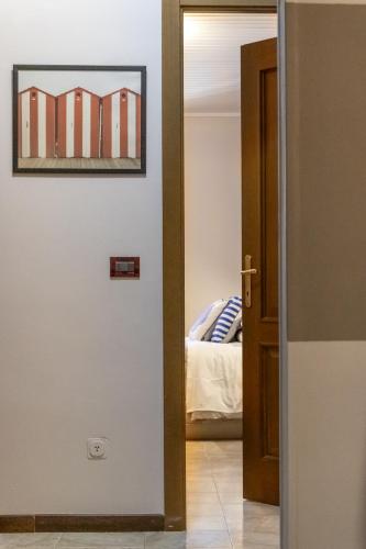 Cà Vivaldi penthouse 5terreparcoにあるベッド