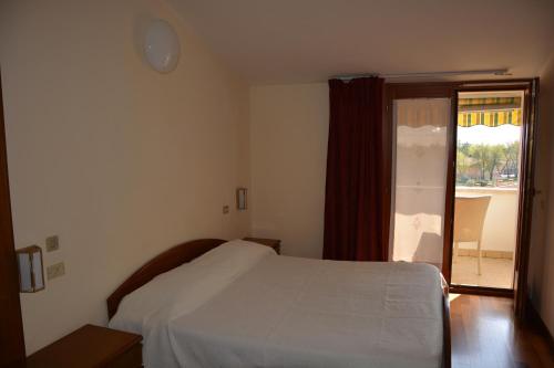 Katil atau katil-katil dalam bilik di Hotel Giotto