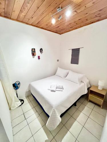 Ένα ή περισσότερα κρεβάτια σε δωμάτιο στο Casa ELA Cuarta