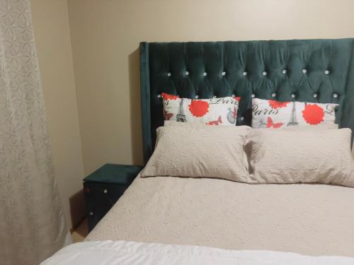 Ένα ή περισσότερα κρεβάτια σε δωμάτιο στο Self Catering luxury Apartment in Witbank