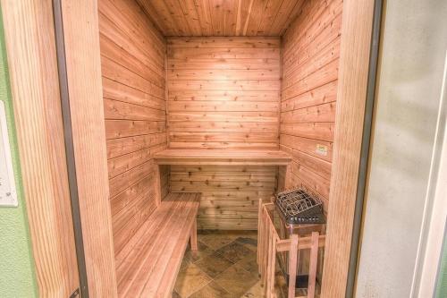 a wooden sauna with a bench and a table at COH1669 - Hawk's View Hideaway home in South Lake Tahoe