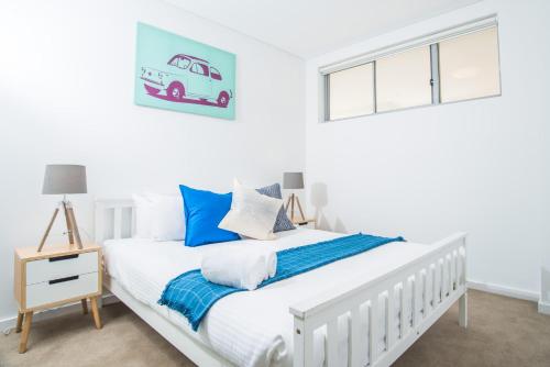 Ένα ή περισσότερα κρεβάτια σε δωμάτιο στο Beautiful home in Epping free Carpark