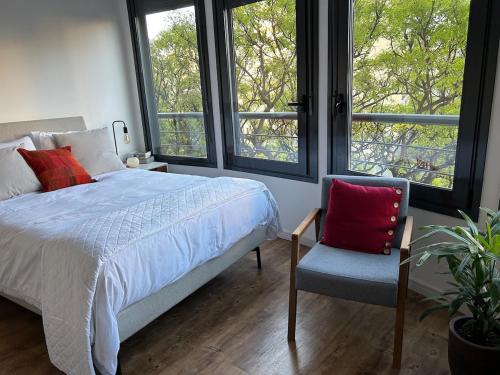 Postel nebo postele na pokoji v ubytování Pocitos luminoso