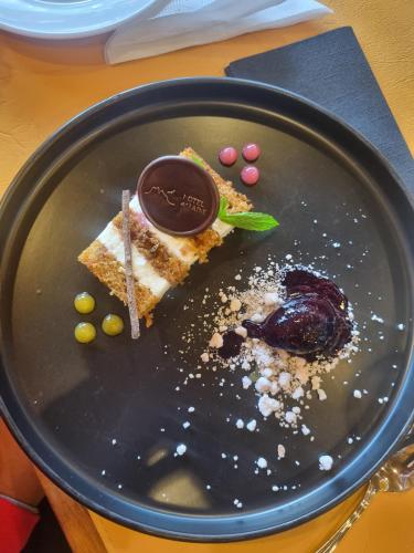 a plate with a piece of dessert on a table at Hotel del Paine in Torres del Paine