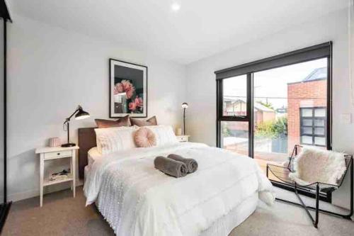 Ένα ή περισσότερα κρεβάτια σε δωμάτιο στο Modern, stylish 2 bed apartment, great location