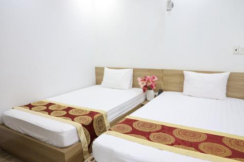 Hùng Vương Hotel Hạ Longにあるベッド