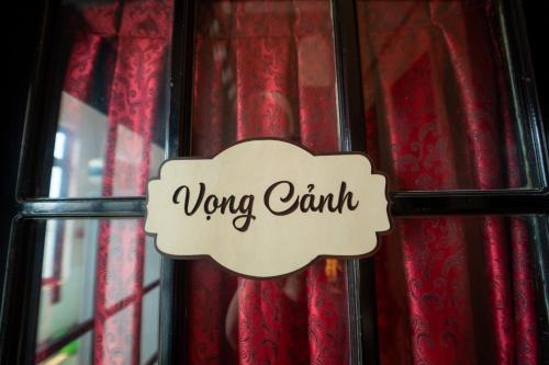 a sign that says wrong camp on a glass door at Perfume Homestay Huế in Hue
