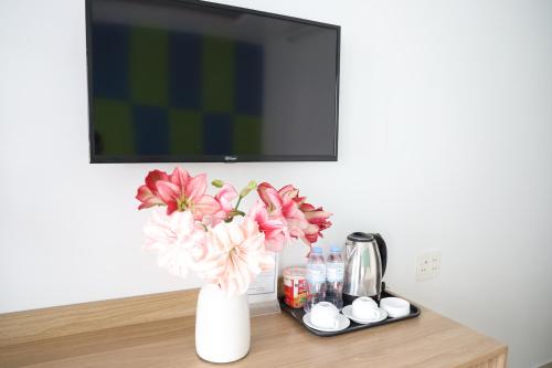 Hùng Vương Hotel Hạ Longにあるテレビまたはエンターテインメントセンター