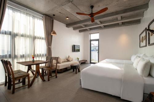 Katil atau katil-katil dalam bilik di Eco & Rustic Home Hoian