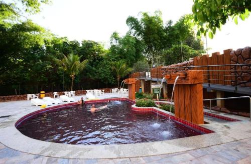 Bazén v ubytování Golden Dolphin Grand Hotel - Apt 2 quartos - Comporta até 7 hospedes mais uma criança de até 5 anos - com Netflix nebo v jeho okolí