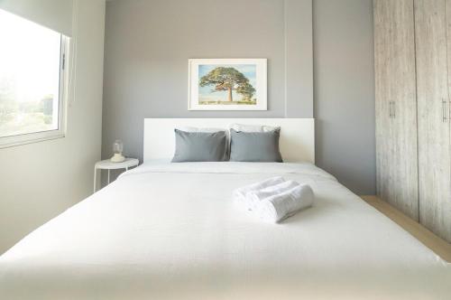 Postel nebo postele na pokoji v ubytování 501 - Spectacular apartment - Air conditioning