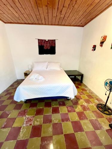 Ένα ή περισσότερα κρεβάτια σε δωμάτιο στο Casa ELA Cuarta