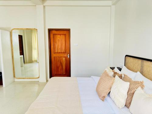 Postel nebo postele na pokoji v ubytování The Suite by Ceilao Villas