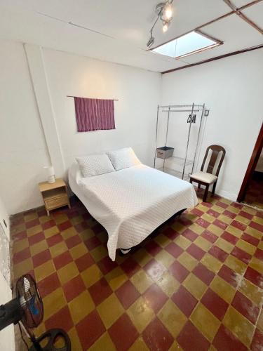Ένα ή περισσότερα κρεβάτια σε δωμάτιο στο Casa ELA Cuarta