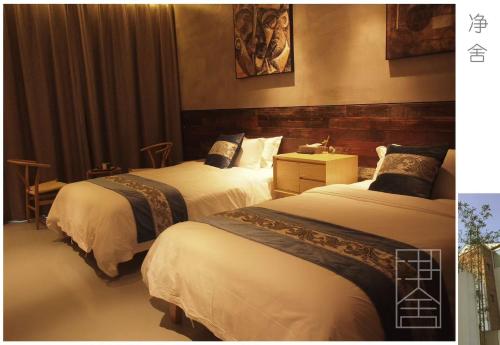 Cama o camas de una habitación en Moganshan Jingshe -莫干山净舍民宿