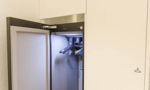 a refrigerator with blue doors in a room at Uiwang Milos Hotel in Uiwang