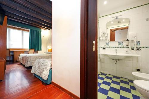 Koupelna v ubytování Hotel Corot