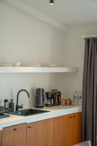 Dapur atau dapur kecil di Gizz Suites