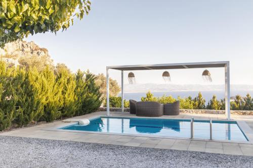 The swimming pool at or close to Evgoro Luxury Suites