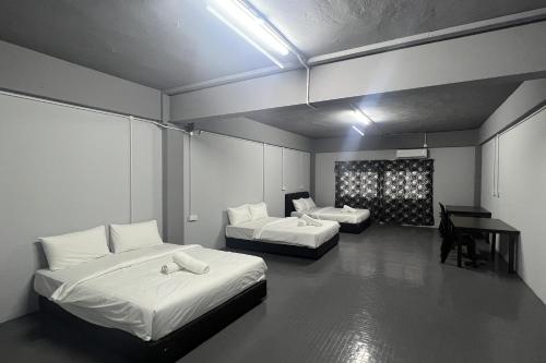 Postel nebo postele na pokoji v ubytování Makotel Hostel Ipoh