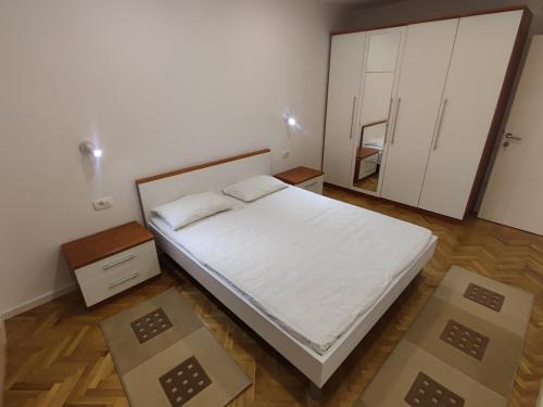 Postel nebo postele na pokoji v ubytování Apartments Šarić