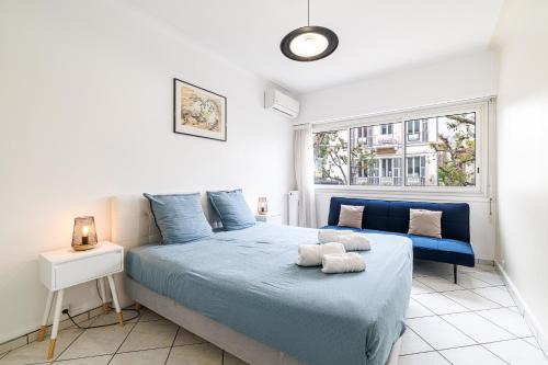 En eller flere senge i et værelse på MARYNAN 1 - Spacieux appartement face à la mer