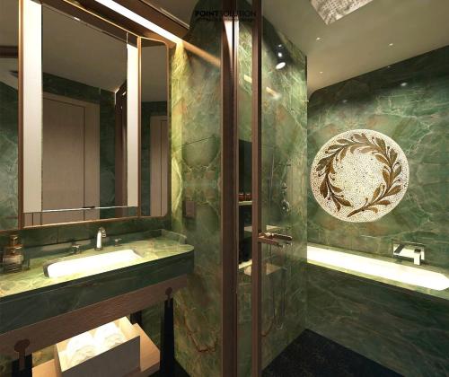 Et badeværelse på La Passion Saigon Hotel